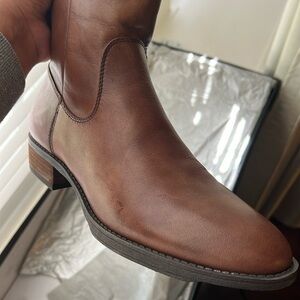 Rustic brown Sole Solesociety knee high boots.